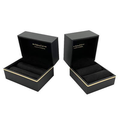 Boîtes de empaquetage de bijoux de luxe de modèle d'or enveloppées par le papier spécial